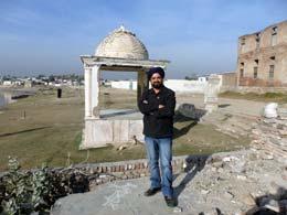 Author next to Akali tomb in Pakistan